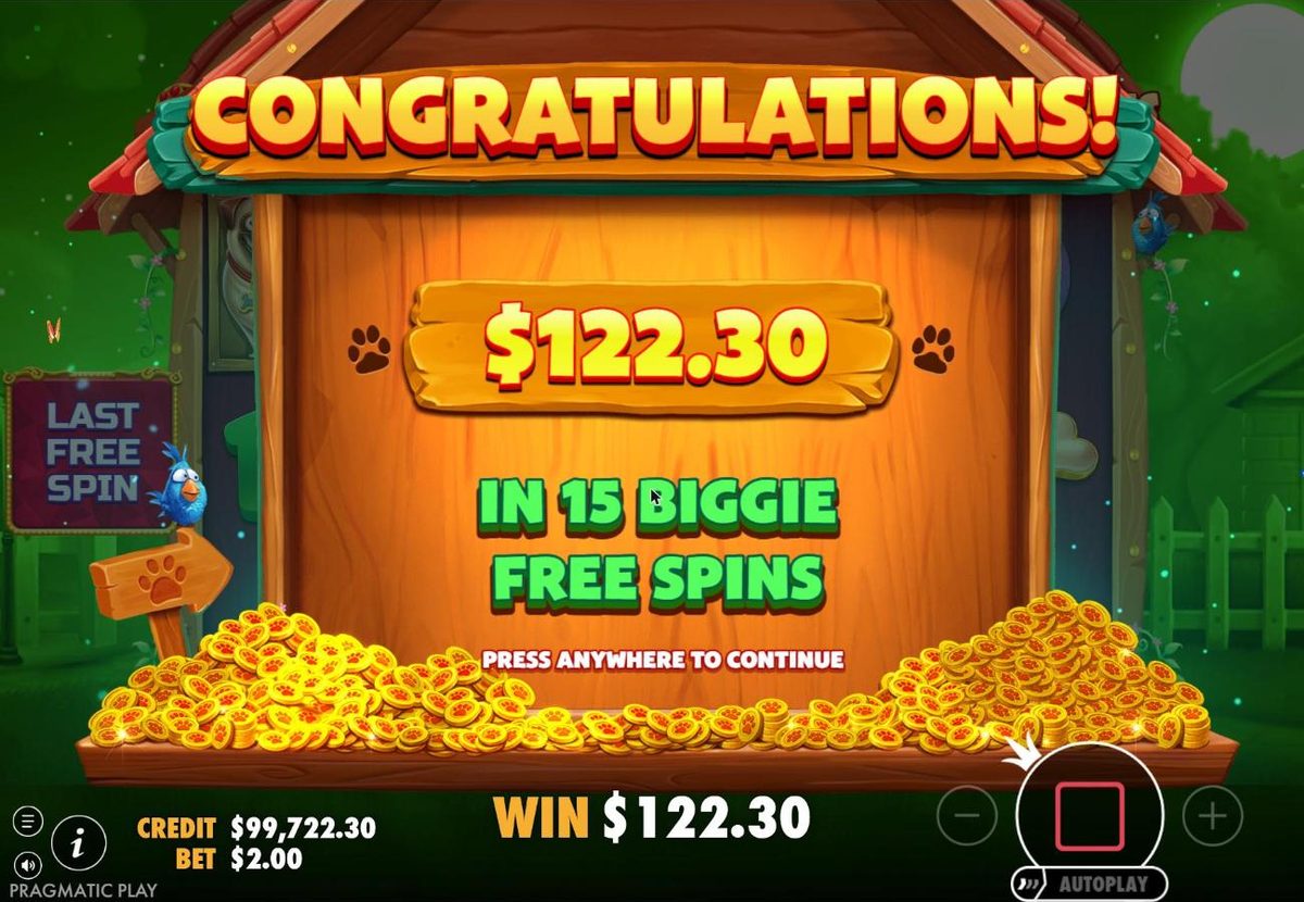Congratulations sign over a pile of gold paw coins: $122.30 in 15 Biggie free spins, with the blue bird on a signpost.