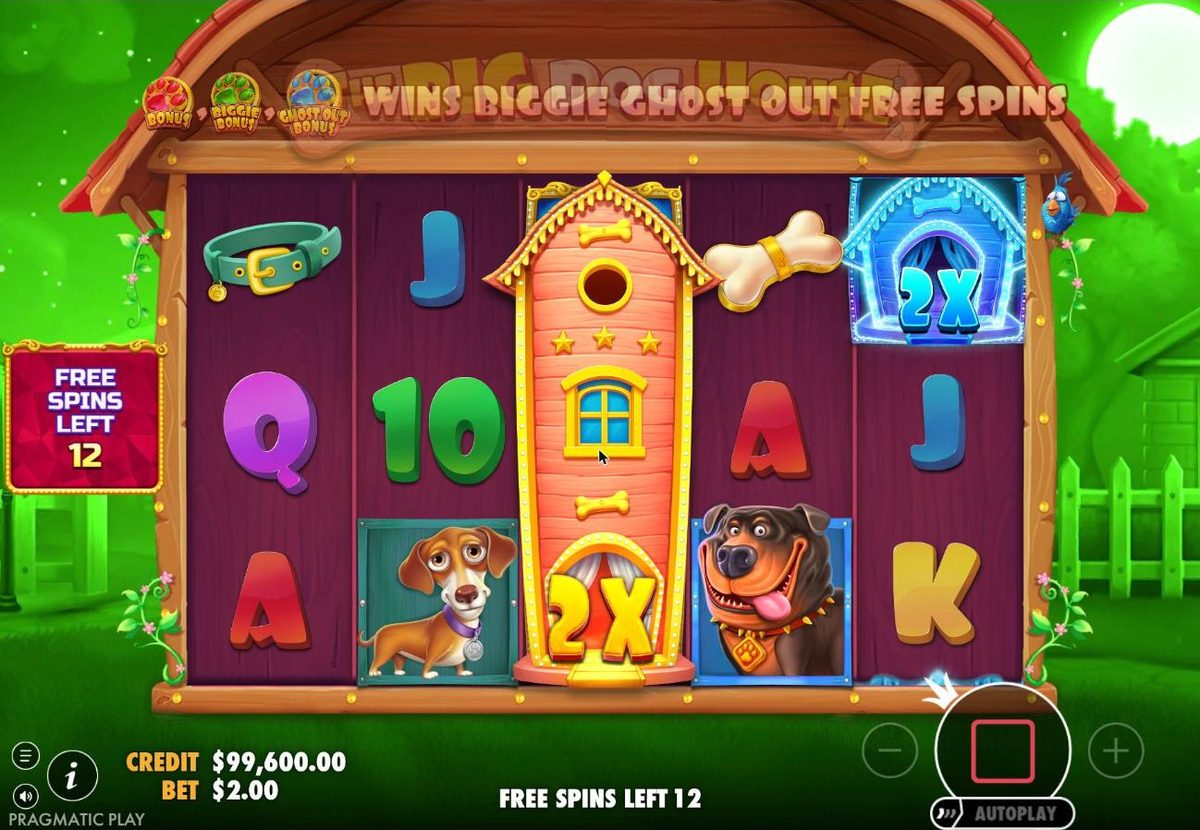 Biggie free spins at night: a tall 2x expanded wild covers reel 3 while an icy blue 2x ghost wild sits on reel 5, with 12 free spins left.